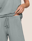 Model is wearing Gisele TENCEL™ Modal Cami & Pant PJ Set in Lead