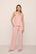 Model is wearing Gisele TENCEL™ Modal Cami & Pant PJ Set in  Silver Pink