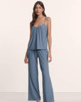 Model is wearing Gisele Printed TENCEL™ Modal Cami & Pant PJ Set in Duo Stripe Slate Blue