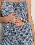 Model is wearing Gisele Printed TENCEL™ Modal Cami & Pant PJ Set in Seashell Navy