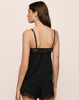 Model is wearing Beatrix TENCEL™ Modal Cami & Short PJ Set in Black