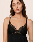 Model is wearing Beatrix TENCEL™ Modal Cami & Short PJ Set in Black