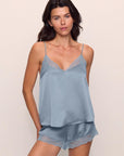 Model is wearing Inez Washable Silk Lace Cami & Short Set in Faded Denim/Faded Denim