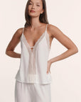 Model is wearing Lara TENCEL™ Modal Cami & Pant PJ Set in Ivory
