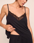 Model is wearing Kari TENCEL™ Modal Cami & Pant PJ Set in Black