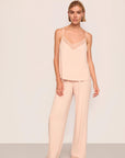 Model is wearing Kari TENCEL™ Modal Cami & Pant PJ Set in Tea Rose