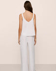 Model is wearing Linen Blend V Neck Cami in White