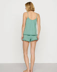 Model is wearing Gisele TENCEL™ Modal Ruffle Cami & Shortie Short Set in Seagrass