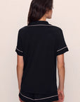 Model is wearing Gisele TENCEL™ Modal Relaxed Short PJ Set in Black/Sorbet Pink