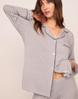 Model is wearing Gisele Printed TENCEL™ Modal Long PJ Set in Geo Sphere Gray Dawn