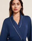 Model is wearing the Gisele TENCEL™ Modal Robe in navy/ivory.