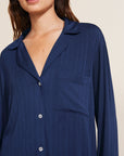 Model wears Gisele TENCEL™ Modal Rib Long PJ Set in navy.