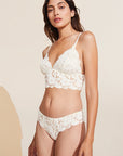 Model wears Naya Longline Bralette in Ivory.