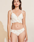 Model wears Naya Longline Bralette in Ivory.