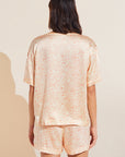 Model wears Inez Washable Silk Printed Short Sleeve Tee & Boxer PJ Set in Marble Rose Cloud.