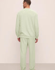 Model is wearing Mens French Terry Jogger in Matcha