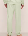 Model is wearing Mens French Terry Jogger in Matcha