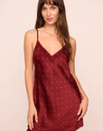 Model is wearing Inez Washable Silk Printed Short Slip in Dot Merlot/Ivory