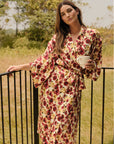 Model is wearing Inez Washable Silk Long Robe in Botanical Flower Merlot