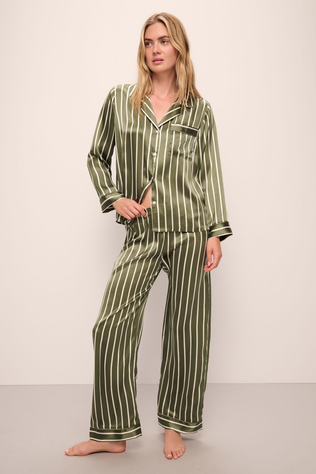 Model is wearing Inez Washable Silk Printed Long PJ Set in Classic Stripe Moss/Moss.