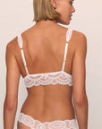 Model is wearing Mariana Thong in White