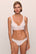 Model is wearing Mariana Thong in White