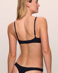 Model is wearing Pima Stretch Cotton Thong in black