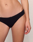 Model is wearing Pima Stretch Cotton Bikini in black