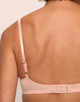 Model is wearing Pima Stretch Cotton Bralette in Buff