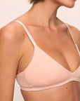 Model is wearing Pima Stretch Cotton Bralette in Buff