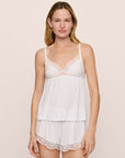 Model is wearing the Beatrix TENCEL™ Modal Cami & Short PJ Set in White