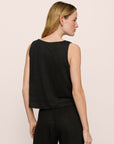 Model is wearing Organic Linen Knit Boat Neck Crop Tank in Black