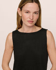 Model is wearing Organic Linen Knit Boat Neck Crop Tank in Black