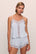 Model is wearing Mariana Romper in ice blue