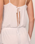 Model is wearing Mariana Romper in White