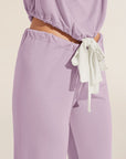 Model wears Gisele TENCEL™ Modal Slouchy PJ Set in lavender/ivory.