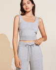 Model is wearing the Recycled Sweater Cropped Tank in Heather Grey.