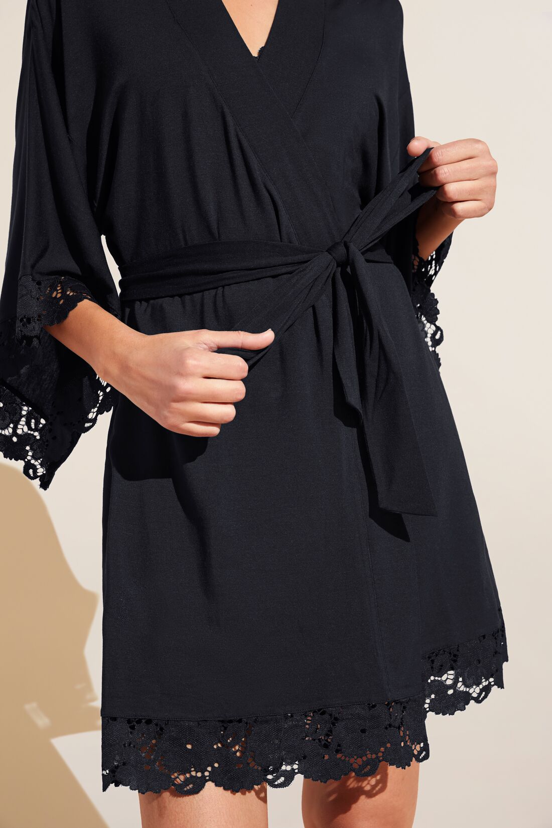 Model wears Naya TENCEL™ Modal Robe in Black.