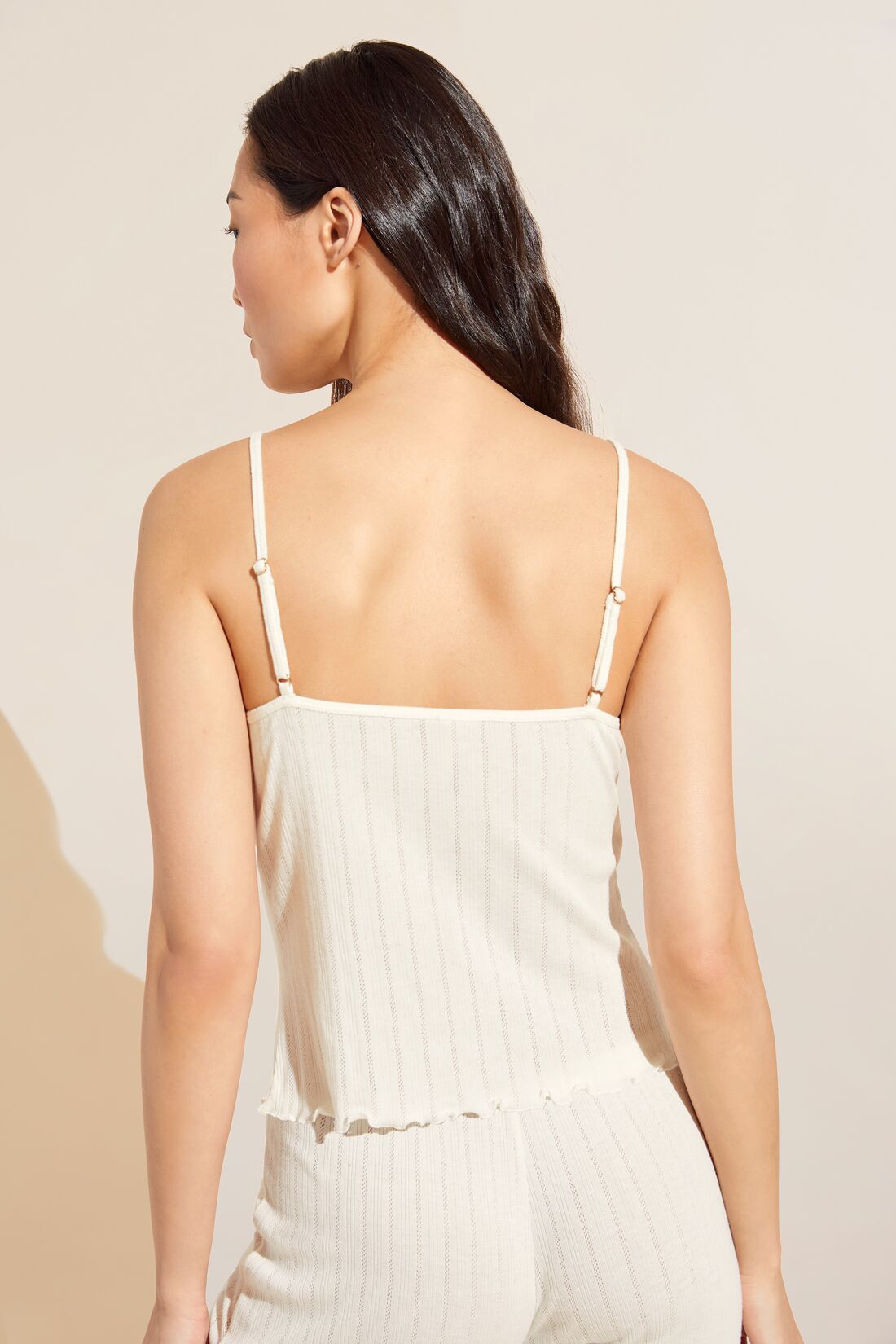 Model wears Pointelle Cami in Ivory.