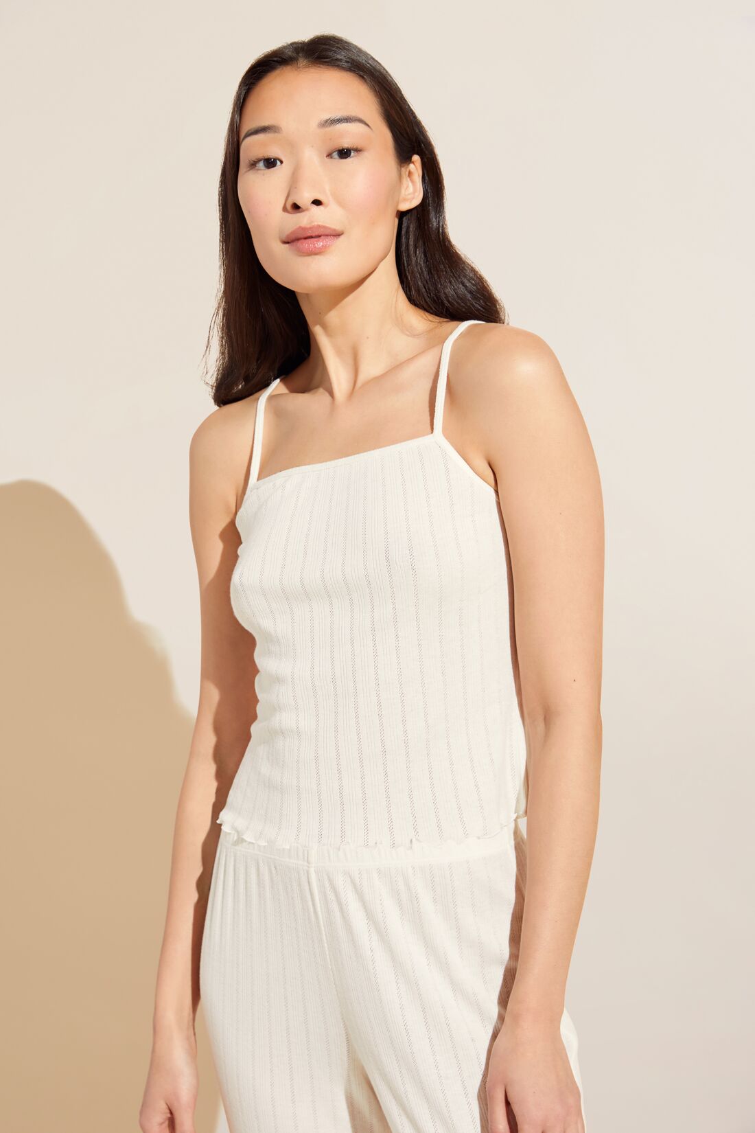 Model wears Pointelle Cami in Ivory.