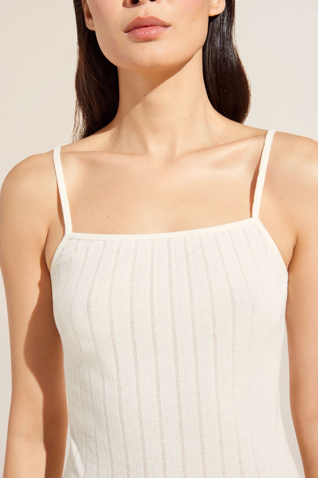 Model wears Pointelle Cami in Ivory.