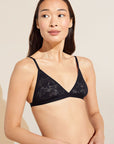 Model wears Soft Stretch Recycled Lace Triangle Bralette in Black.