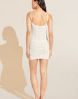 Model wears Soft Stretch Recycled Lace Slip in Ivory.