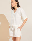Model wears Crinkle Woven Short Sleeve Top & Short Set in Ivory/Canyon Sunset.