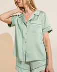 Model wears Inez Washable Silk Short PJ Set in Surf Spray/Agave.