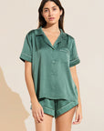 Model wears Inez Washable Silk Short PJ Set in Agave/Surf Spray.