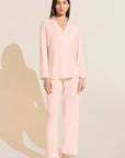 Model is Wearing the Gisele TENCEL™ Modal Long PJ Set in Petal Pink/Ivory.