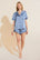 Model wears Inez Washable Silk Short PJ Set in Wedgewood Blue/Navy.