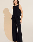 Model wears Organic Linen Knit High Waisted Pant in Black.