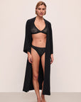Model is wearing Soft Stretch Recycled Lace Plunge Bralette in Black.